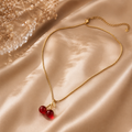 Gold necklace with cherry pendants 