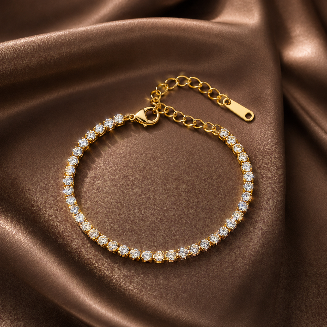 Gold bracelet with diamonds on a brown satin background