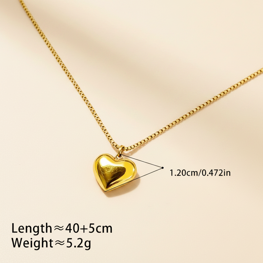 Gold heart,shaped pendant necklace with measurements on a white background