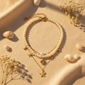 Multi,layered pearl necklace with starfish charms and measurements on a white background
